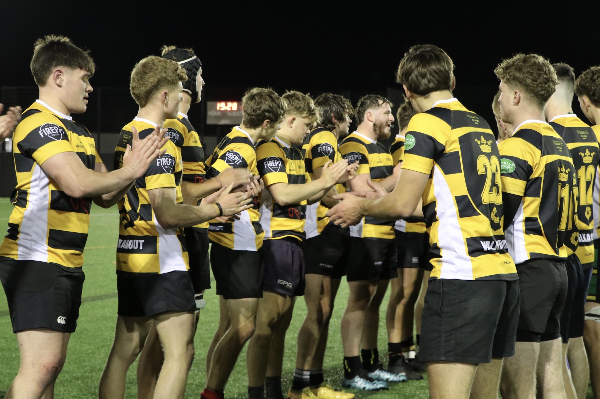 SURFC players shaking hands after a match